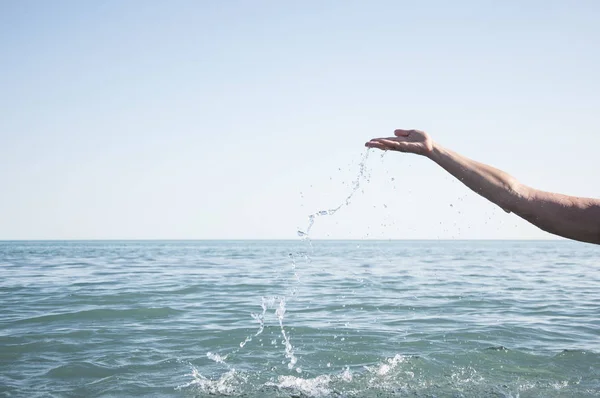 Hand and water. — Stock Photo, Image