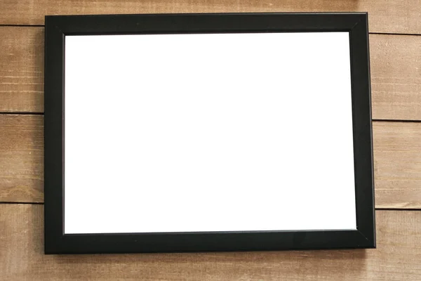 Blank photo frame on the wall — Stock Photo, Image