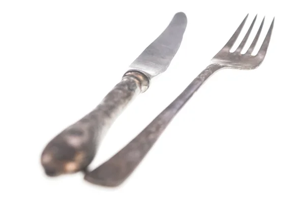 Ročník nůž a vidličku na bílém pozadí — Stock fotografie