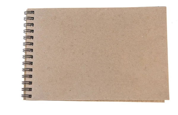Notebook op bruine achtergrond bovenaanzicht kopieerruimte Stockafbeelding