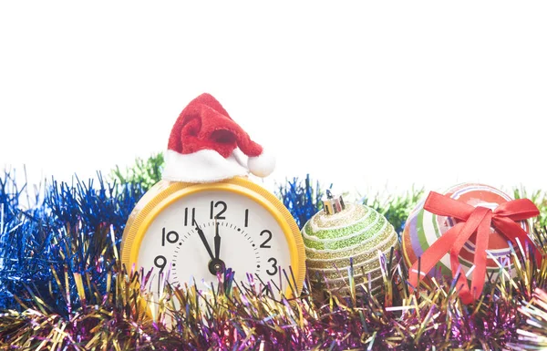 Christmas balls and alarm clock isolated on white — Stock Photo, Image