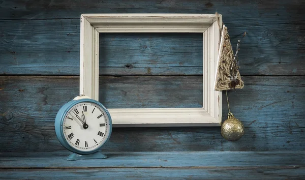 Blank frame wood blocks with vintage alarm clock — Stock Photo, Image