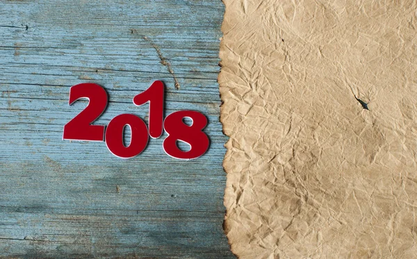 Feliz año nuevo 2018 en la mesa de madera — Foto de Stock