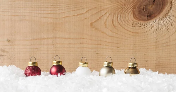 Christmas colorful balls on snow — Stock Photo, Image