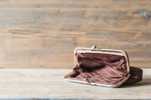 Vintage purse on wooden background. — Stock Photo, Image