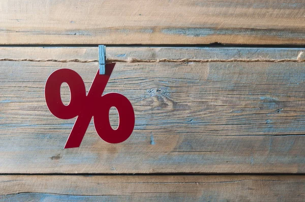Symbol of percent on wooden background — Stock Photo, Image