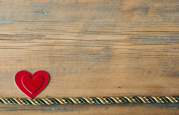 Καρδιές σε ξύλινα φόντο — Φωτογραφία Αρχείου
