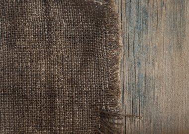 ahşap masa arka plan üzerine çuval bezi doku