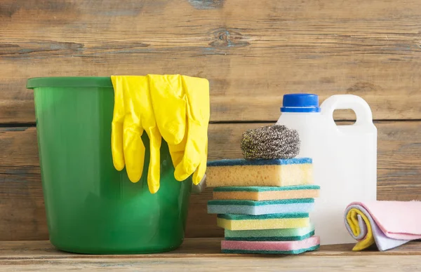 Rubber gloves brush duster and cleaning products — Stock Photo, Image