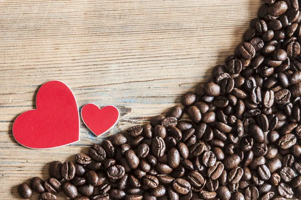 Kahve, kahve çekirdekleri eski ahşap backgrou büyü için kullanılan seviyorum — Stok fotoğraf