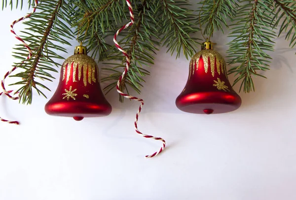 Christmas composition. fir and bell on white background with cop — Stock Photo, Image