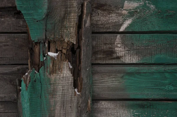 Fundo em um estilo grunge na forma de velhas tábuas de madeira — Fotografia de Stock