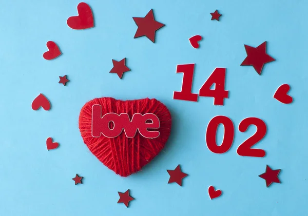 Love word, heart and stars on soft blue paper  background. Top v