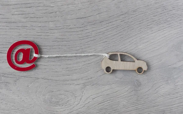 Car toy and email sign on white wood background minimal creative — ストック写真