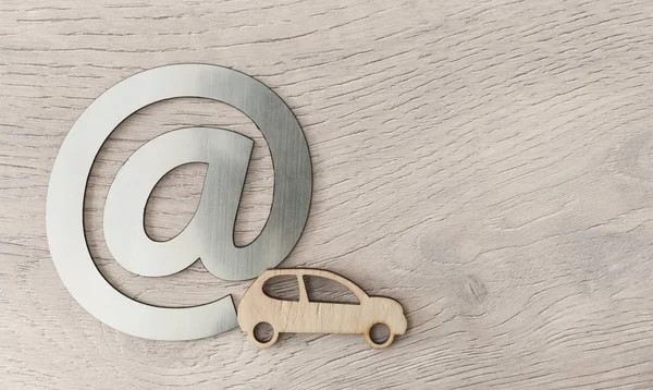 Car toy and email sign on white wood background minimal creative — ストック写真