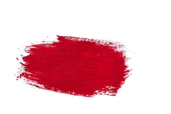 Red paint artistic dry brush stroke. — Stockfoto