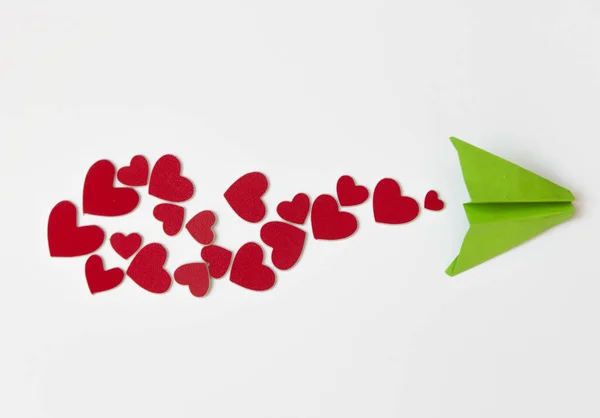 Valentine's Day background. Paper plane with red heart flying on — 스톡 사진