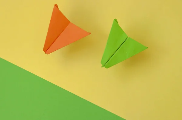 paper planes on colorful paper background, Business competition