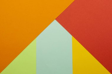 Kağıt ile sıralanmış farklı renklerdeki parlak soyut şekillerin dokusu