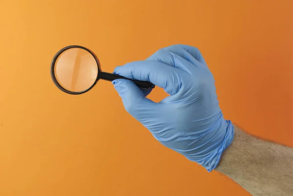Hand Gesture Blue Medical Glove Magnifying Glass Close Selective Focus — Stock Photo, Image