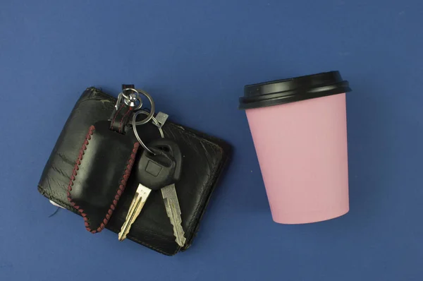 Car Key Pink Paper Cup Coffee Black Wallet Blue Background — Stock Photo, Image