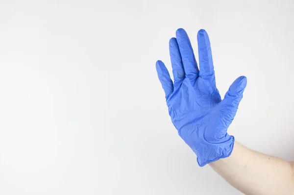 Doctor Hand Steriele Handschoenen Met Teken Witte Muur Achtergrond Pandemie — Stockfoto