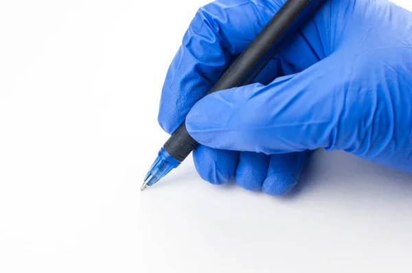 Female Hand Medical Glove Holds Pen Writes Air White Background — Stock Photo, Image