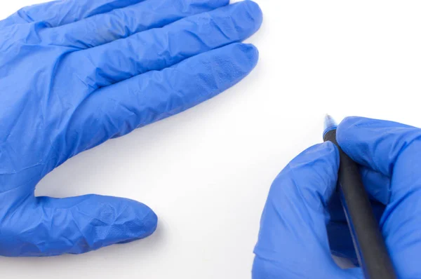 Female Hand Medical Glove Holds Pen Writes Air White Background — Stock Photo, Image