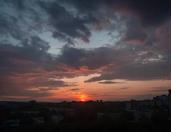 Sunset in the city with clouds