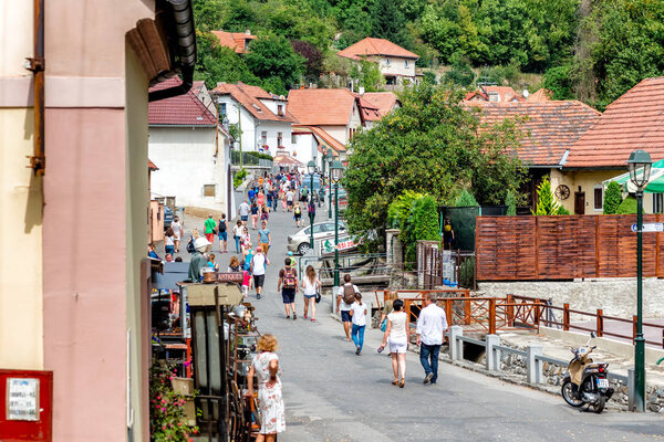 KARLSTEJN, CZECH REPUBLIC - SEPTEMBER 03, 2016: Main village street leading to Karlstejn Castle. Karlstejn Village, Central Bohemia, Czech Republic.