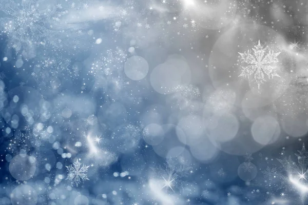 Blue holiday abstract background with stars and snowflakes — Stock Photo, Image