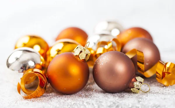 Closeup on golden Chrismas decorations — Stock Photo, Image