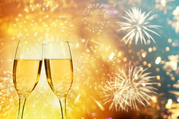 Champagne glasses on sparkling background — Stock Photo, Image