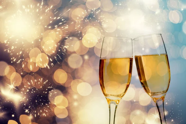 Champagne glasses on sparkling background — Stock Photo, Image