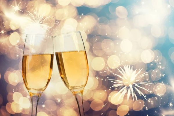 Champagne glasses on sparkling background — Stock Photo, Image