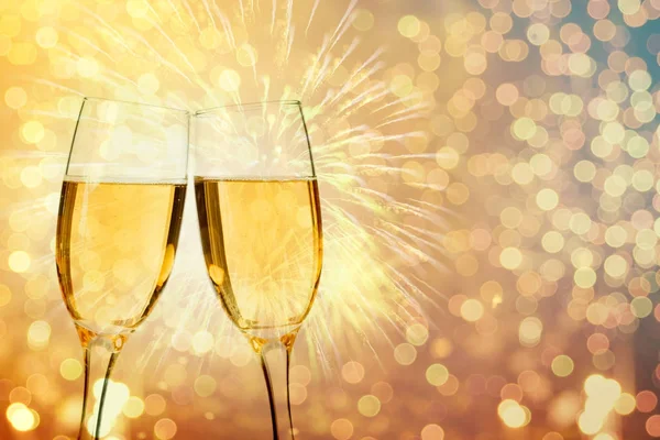 Champagne glasses on sparkling background — Stock Photo, Image