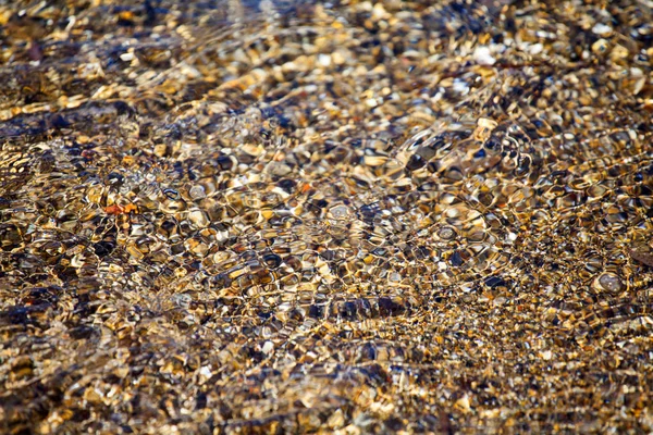 Kieselsteine im Meer — Stockfoto