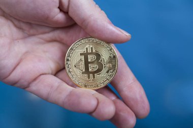 Bitcoin Cryptocurrency tutan adam