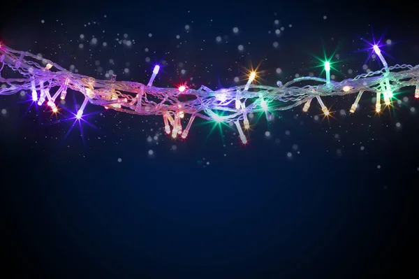 Fondo navideño con luces y espacio libre de texto. —  Fotos de Stock