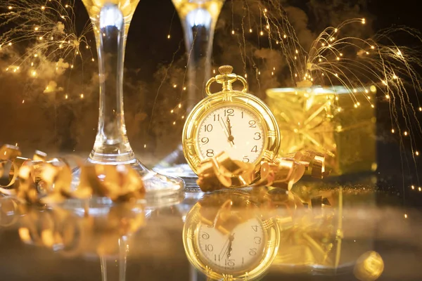 New Year's at midnight - Old clock with holiday lights — Stock Photo, Image
