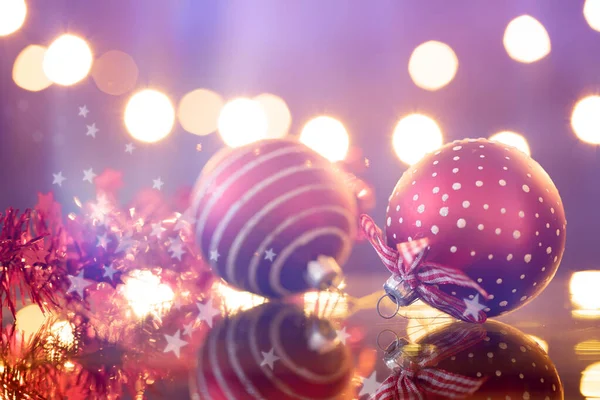 Christmas balls on bokeh holiday background