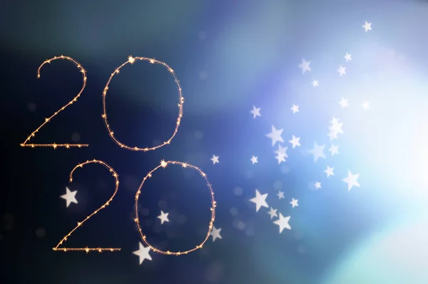 Šťastný nový rok 2020! Elegantní zlatý text třpytivých světel. — Stock fotografie
