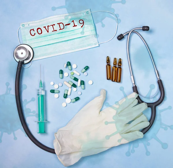 Covid 19の概念 コロナウイルス病 2019 Ncv 武漢コロナウイルス 青い背景の医療機器 碑文コロノウイルスCovid — ストック写真