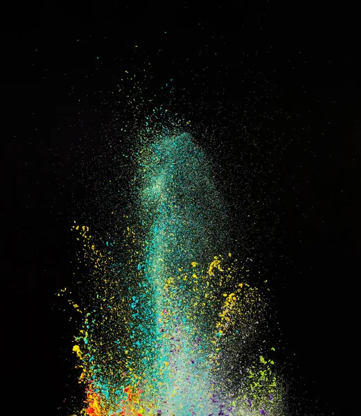 Explosion de poudre colorée sur fond noir. — Photo