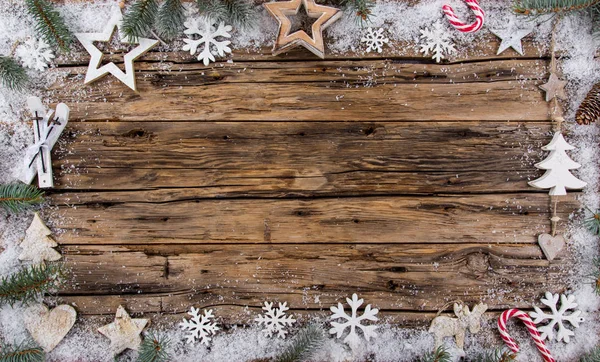Різдвяні прикраси на дерев'яному фоні — стокове фото