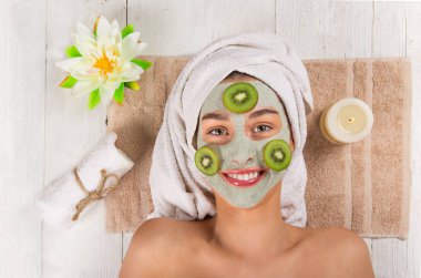 Young healthy woman with face mask. clipart