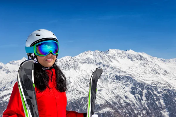 Beautiful brunette woman with ski — Stock Photo, Image