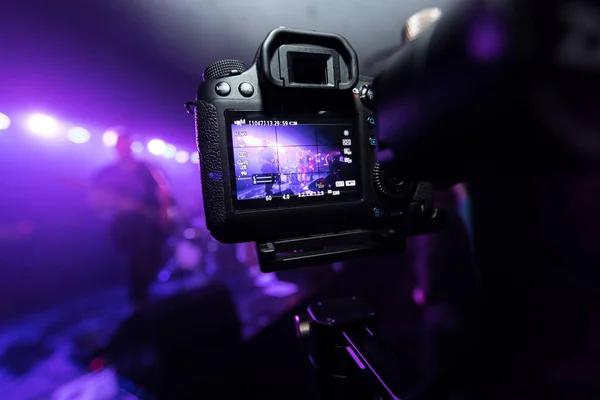 Man capturing the moment on rock concert. — Stock Photo, Image