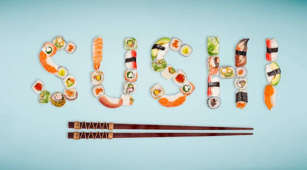 Traditional japanese sushi pieces making inscription. — Stock Photo, Image