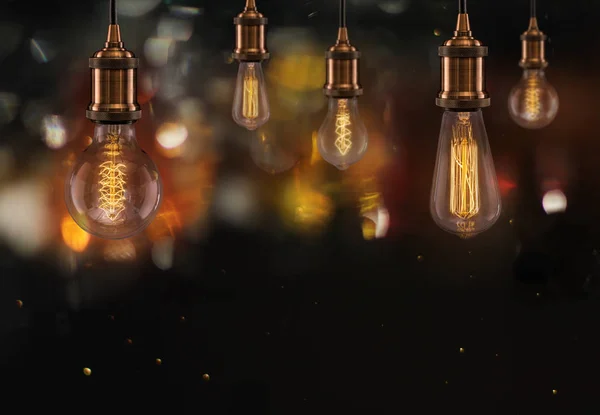 Vintage Edison light bulbs on dark background. — Stock Photo, Image